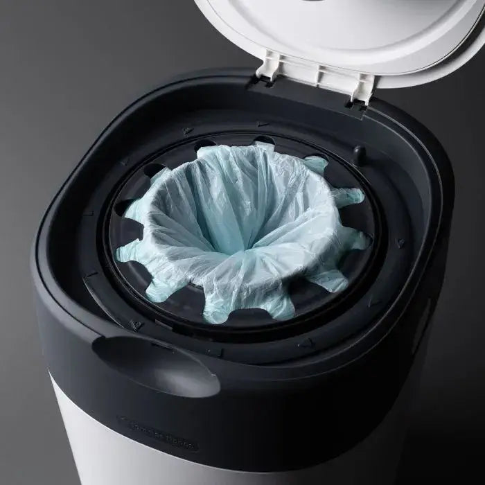 Basurero de pañales Twist Click con 6 repuestos Tommee Tippee